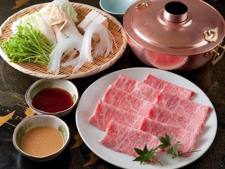 Shabu shabu is a type of hot pot meal where you swish really thinly cut sha...